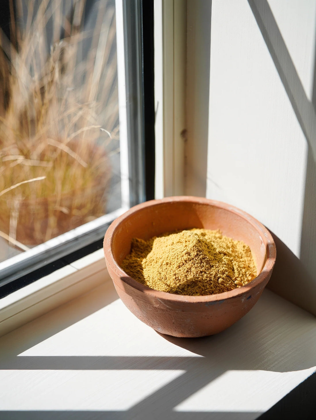 Traditional solar drying method for natural ingredients in Fulkhari Multani Mitti clay masks