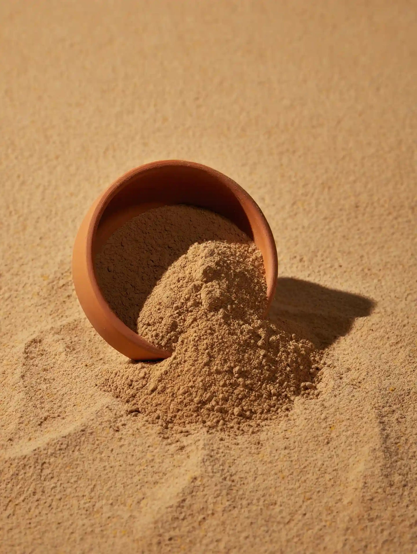 Multani Mitti Fuller's Earth clay powder in wooden bowl - natural purifying skincare ingredient